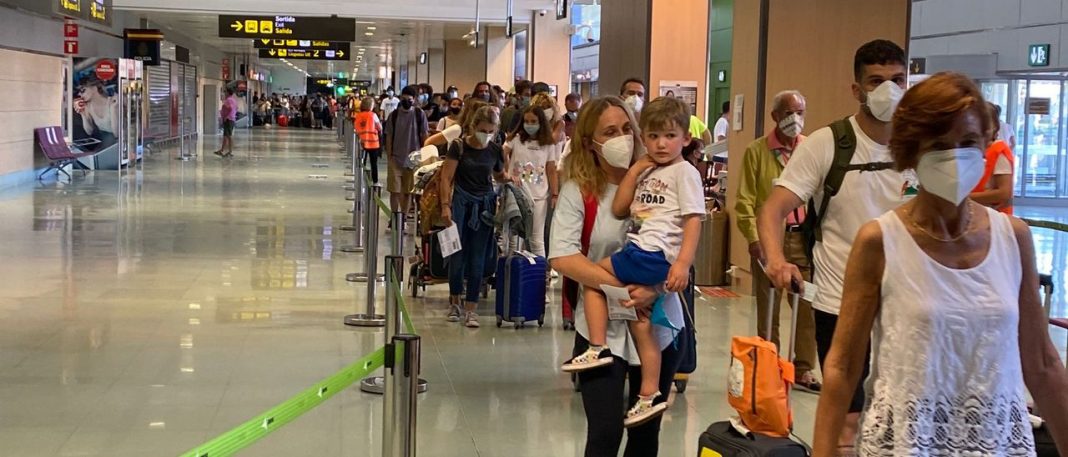 Queues in Ibiza airport due to health checks on arrivals to the island