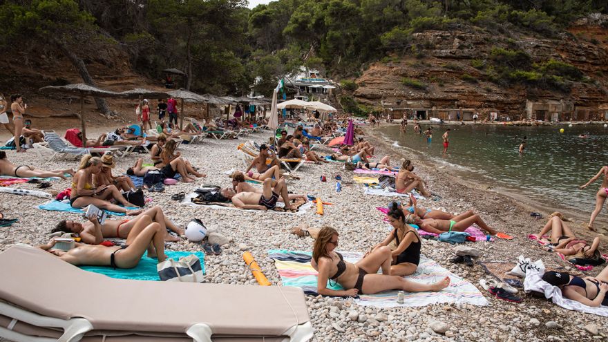 Hours of queuing to swim at a beach in Ibiza
