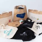 Different cloth and raffia bags.