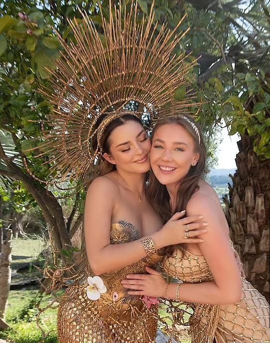 Rose posing with a friend of hers during her 'Earth Party'.