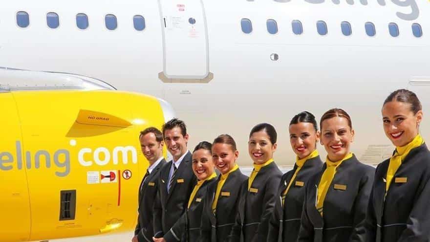Vueling accepts and will pay the fine for requiring heels, makeup and mascara on flight attendants