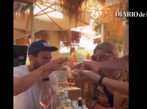 Jamie Dornan, surprised with a magic trick in an Ibiza beach bar