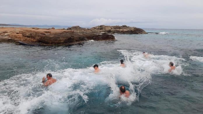 The first swim of the year in Formentera is in es Caló