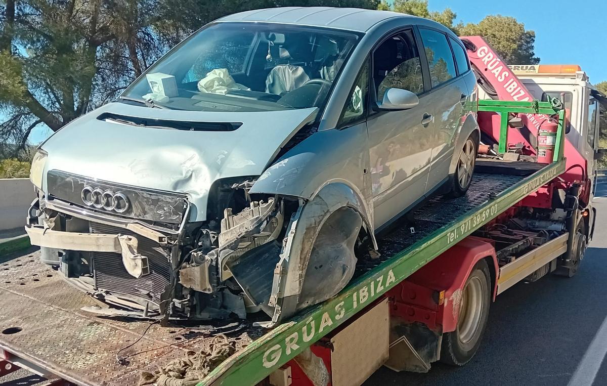 One of the cars, with the front part destroyed after the accident