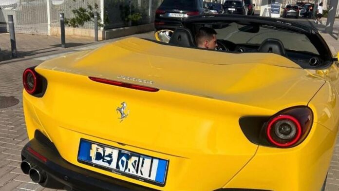 Illegal racing of Ferraris on an avenue of Ibiza