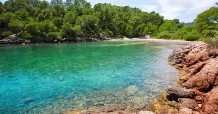 Walk a serene hiking route from Sant Carles to Cala Mastella