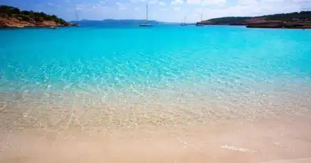 Why are Ibiza’s waters so vividly blue?