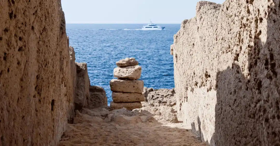 Ibiza beaches stone piles