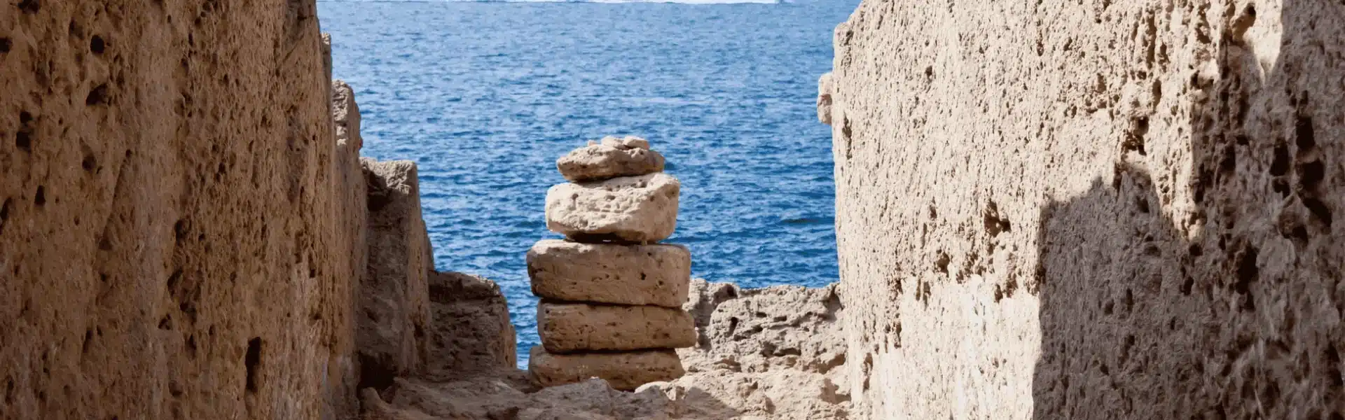 Ibiza beaches stone piles