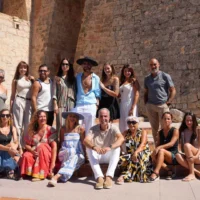 Group photo of participants, designers, artists, and collaborators of the Ibiza Fashion Show 2026, during the event presentation. | Ibiza Fashion Show