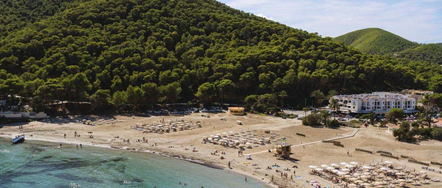 Mondrian Ibiza and Hyde Ibiza hotels overlooking Cala Llonga Bay in Ibiza.