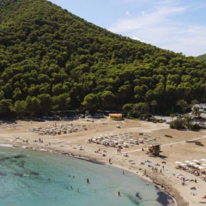 Mondrian Ibiza and Hyde Ibiza hotels overlooking Cala Llonga Bay in Ibiza.