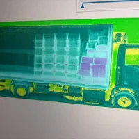Image from the X-ray scan of the truck's interior, taken with the Customs "Medusa" scanner, showing the two loads: the legal cargo and—on the right—the bales of cocaine. / Customs-AEAT